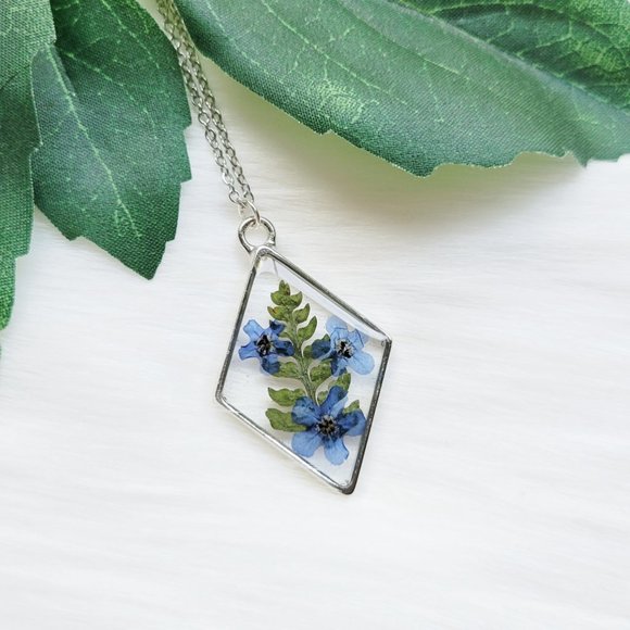 Lovely Lotus Jewelry - Pressed Dried Blue Forget Me Not Flower and Leaves Bezel Resin Pendant Necklace